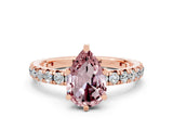 Rose gold Pear Cut Cut Diamond Pavé Band with Four-Prong Setting