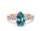 Rose gold Pear Cut Cut Diamond Pavé Band with Four-Prong Setting