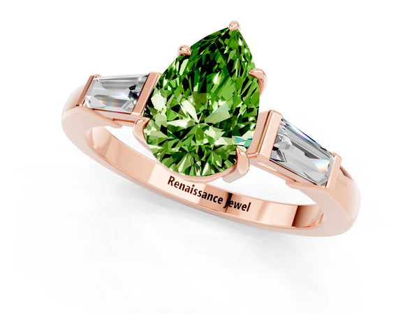 Rose gold Pear Cut Cut Diamond Ring with Tapered Baguette Side Stones in Four-Prong Setting