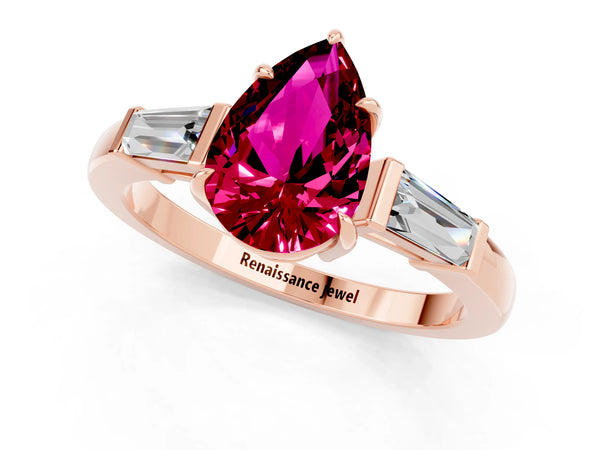 Rose gold Pear Cut Garnet Three-Stone Ring with Tapered Baguette Side Stones and Prong Setting
