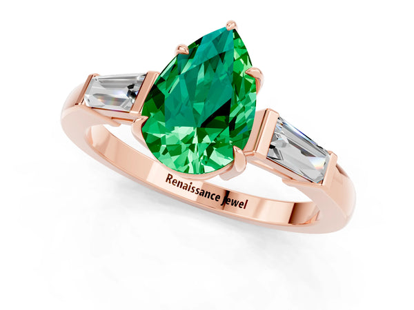 Rose gold Pear Cut Emerald Three-Stone Ring with Tapered Baguette Side Stones and Prong Setting
