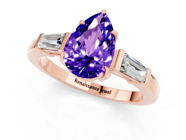 Rose gold Pear Cut Tanzanite Three-Stone Ring with Tapered Baguette Side Stones and Prong Setting