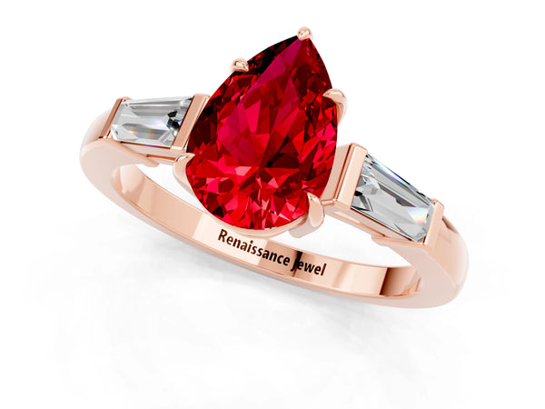 Rose gold Pear Cut Cut Diamond Ring with Tapered Baguette Side Stones in Four-Prong Setting