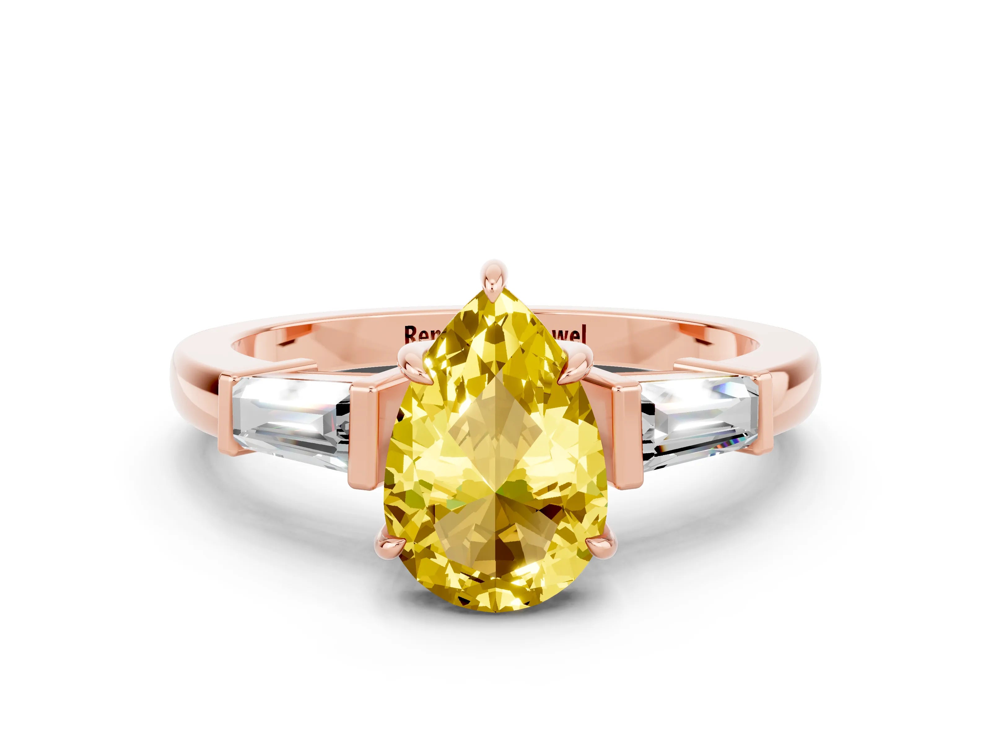 Rose gold Pear Cut Cut Diamond Ring with Tapered Baguette Side Stones in Four-Prong Setting