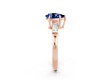 Rose gold Pear Cut Cut Diamond Ring with Tapered Baguette Side Stones in Four-Prong Setting_2
