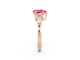 Rose gold Pear Cut Cut Diamond Ring with Tapered Baguette Side Stones in Four-Prong Setting_2