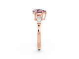 Rose gold Pear Cut Cut Diamond Ring with Tapered Baguette Side Stones in Four-Prong Setting_2