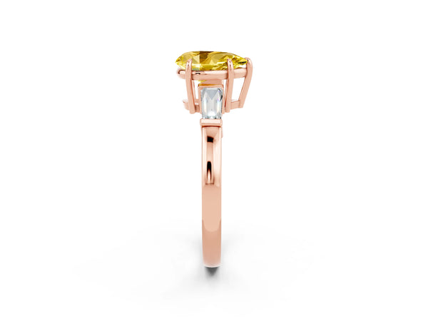 Rose gold Pear Cut Yellow Sapphire Three-Stone Ring with Tapered Baguette Side Stones and Prong Setting