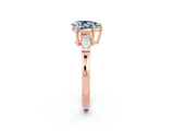 Rose gold Pear Cut Cut Diamond Ring with Tapered Baguette Side Stones in Four-Prong Setting_2