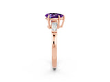 Rose gold Pear Cut Cut Diamond Ring with Tapered Baguette Side Stones in Four-Prong Setting_2