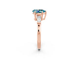 Rose gold Pear Cut Cut Diamond Ring with Tapered Baguette Side Stones in Four-Prong Setting_2