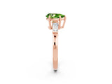 Rose gold Pear Cut Cut Diamond Ring with Tapered Baguette Side Stones in Four-Prong Setting_2