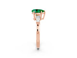 Rose gold Pear Cut Cut Diamond Ring with Tapered Baguette Side Stones in Four-Prong Setting_2