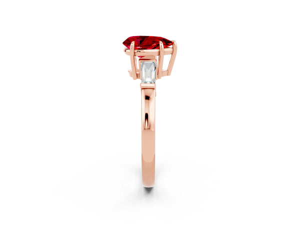 Rose gold Pear Cut Cut Diamond Ring with Tapered Baguette Side Stones in Four-Prong Setting