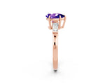 Rose gold Pear Cut Cut Diamond Ring with Tapered Baguette Side Stones in Four-Prong Setting_2