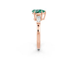 Rose gold Pear Cut Cut Diamond Ring with Tapered Baguette Side Stones in Four-Prong Setting_2