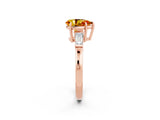 Rose gold Pear Cut Cut Diamond Ring with Tapered Baguette Side Stones in Four-Prong Setting_2