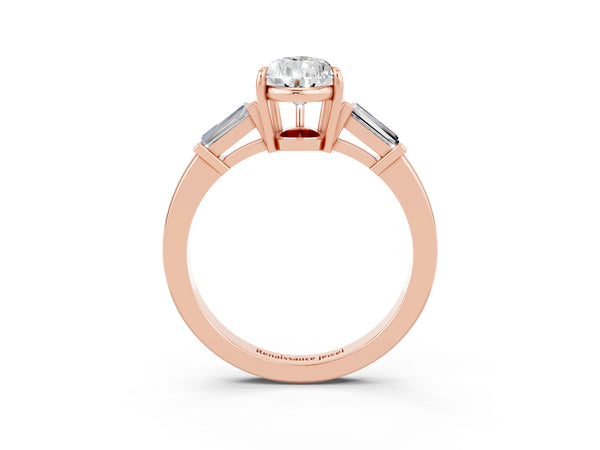 Rose gold Pear Cut Moissanite Three-Stone Ring with Tapered Baguette Side Stones and Prong Setting
