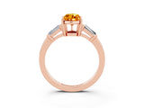 Rose gold Pear Cut Cut Diamond Ring with Tapered Baguette Side Stones in Four-Prong Setting_3