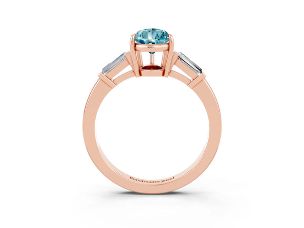 Rose gold Pear Cut Cut Diamond Ring with Tapered Baguette Side Stones in Four-Prong Setting