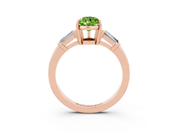 Rose gold Pear Cut Cut Diamond Ring with Tapered Baguette Side Stones in Four-Prong Setting