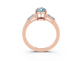 Rose gold Pear Cut Cut Diamond Ring with Tapered Baguette Side Stones in Four-Prong Setting_3
