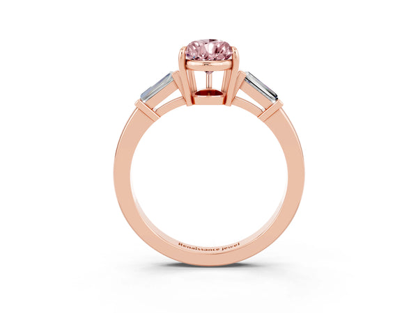 Rose gold Pear Cut Cut Diamond Ring with Tapered Baguette Side Stones in Four-Prong Setting