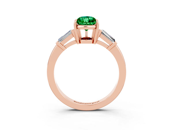 Rose gold Pear Cut Emerald Three-Stone Ring with Tapered Baguette Side Stones and Prong Setting