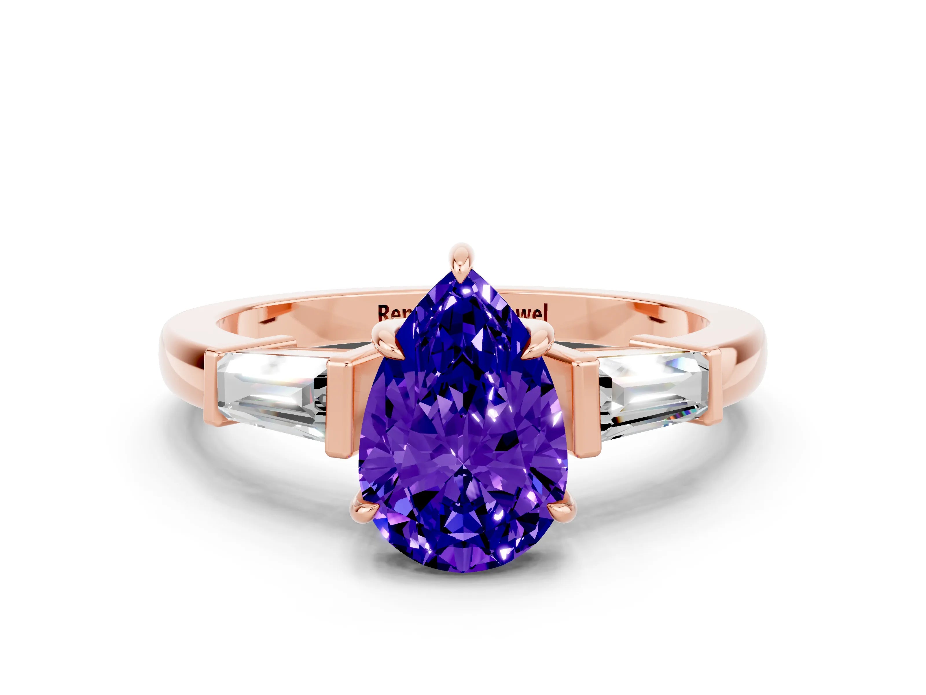 Rose gold Pear Cut Cut Diamond Ring with Tapered Baguette Side Stones in Four-Prong Setting