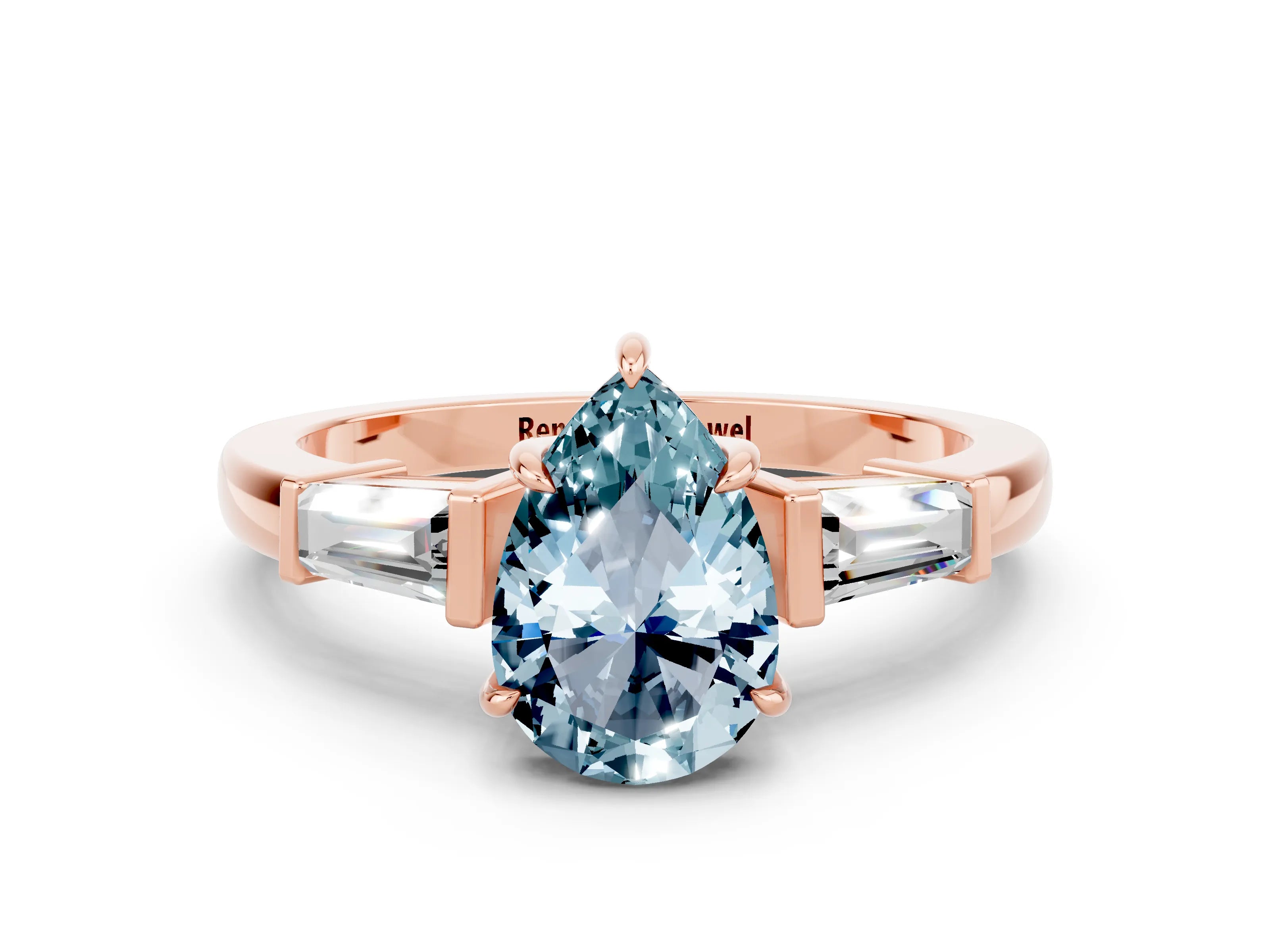 Rose gold Pear Cut Cut Diamond Ring with Tapered Baguette Side Stones in Four-Prong Setting