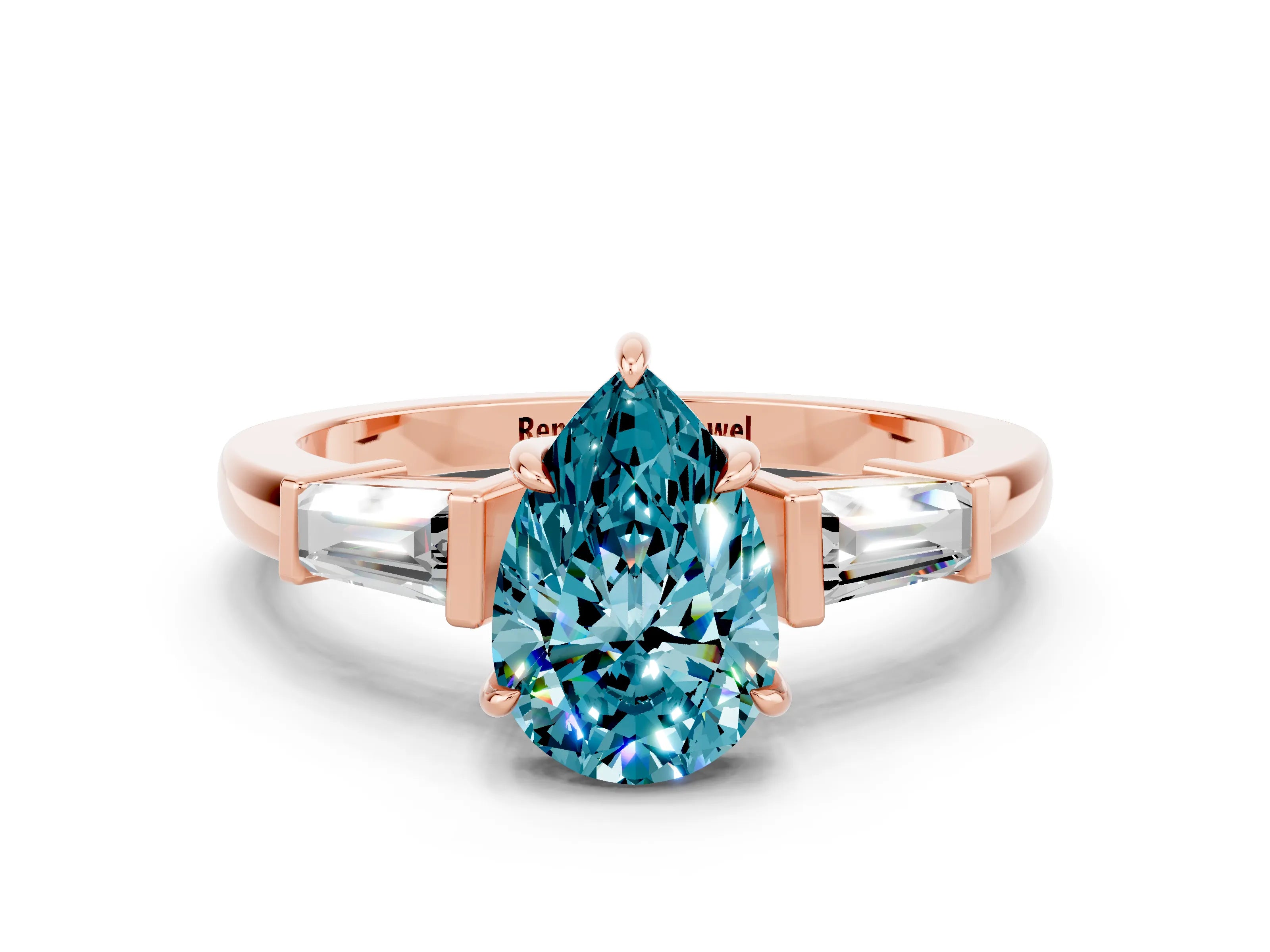 Rose gold Pear Cut Cut Diamond Ring with Tapered Baguette Side Stones in Four-Prong Setting