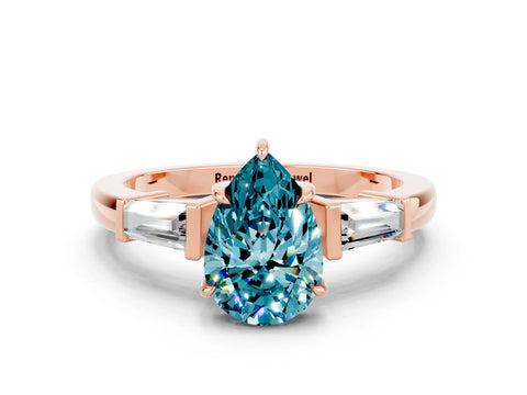 Rose gold Pear Cut Cut Diamond Ring with Tapered Baguette Side Stones in Four-Prong Setting