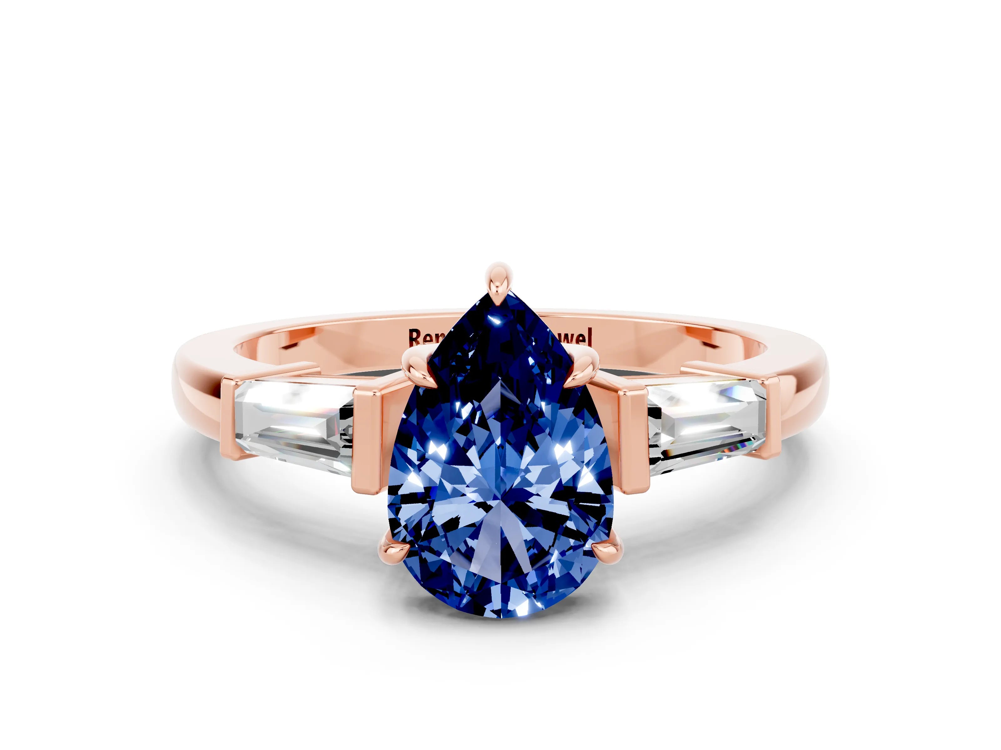 Rose gold Pear Cut Cut Diamond Ring with Tapered Baguette Side Stones in Four-Prong Setting
