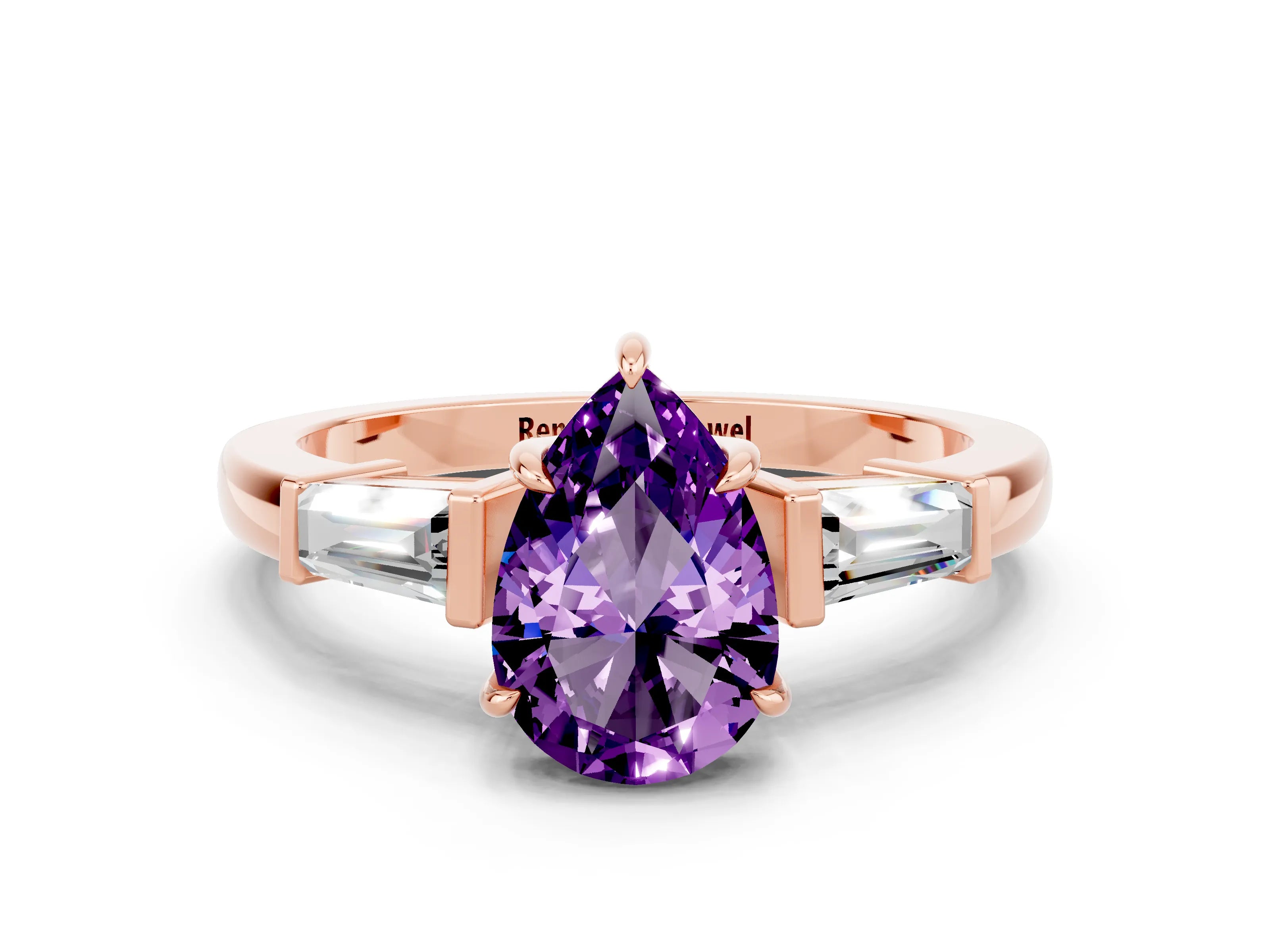 Rose gold Pear Cut Cut Diamond Ring with Tapered Baguette Side Stones in Four-Prong Setting