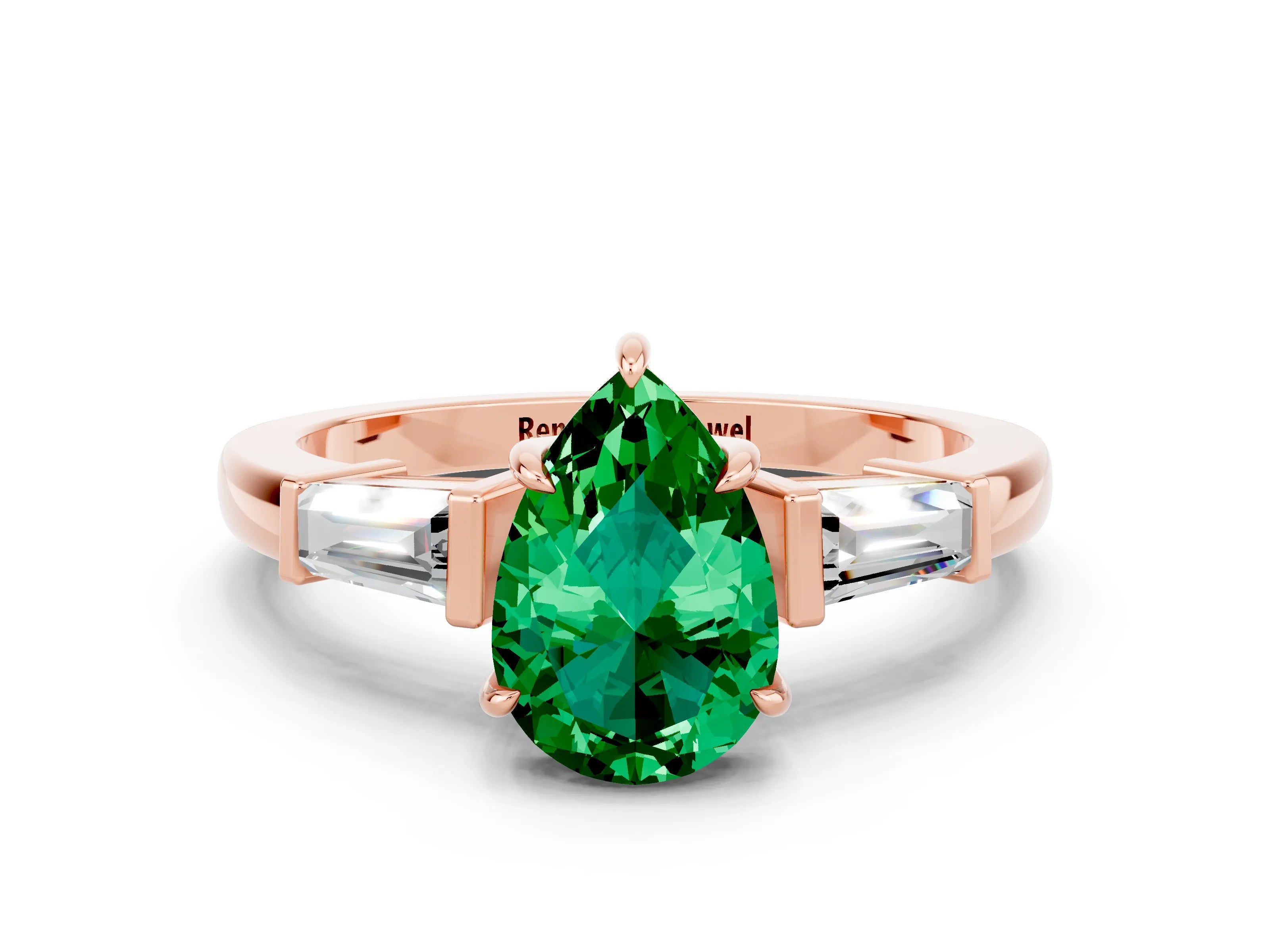 Rose gold Pear Cut Cut Diamond Ring with Tapered Baguette Side Stones in Four-Prong Setting