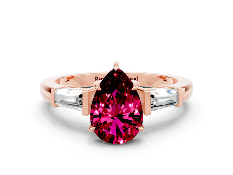 Rose gold Pear Cut Cut Diamond Ring with Tapered Baguette Side Stones in Four-Prong Setting