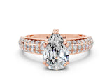 Rose gold Pear Cut Cut Pave Diamond Engagement Ring with Channel Set Band and Four-Prong Setting