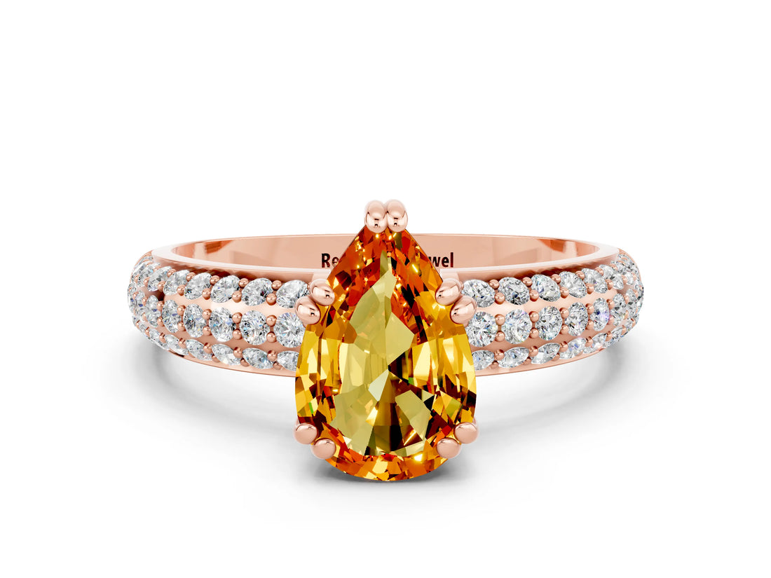 Rose gold Pear Cut Cut Pave Diamond Engagement Ring with Channel Set Band and Four-Prong Setting