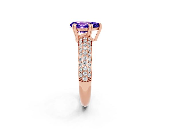 Rose gold Pear Cut Tanzanite Solitaire Ring with Multi-Row Round Pavé Band and Prong Setting