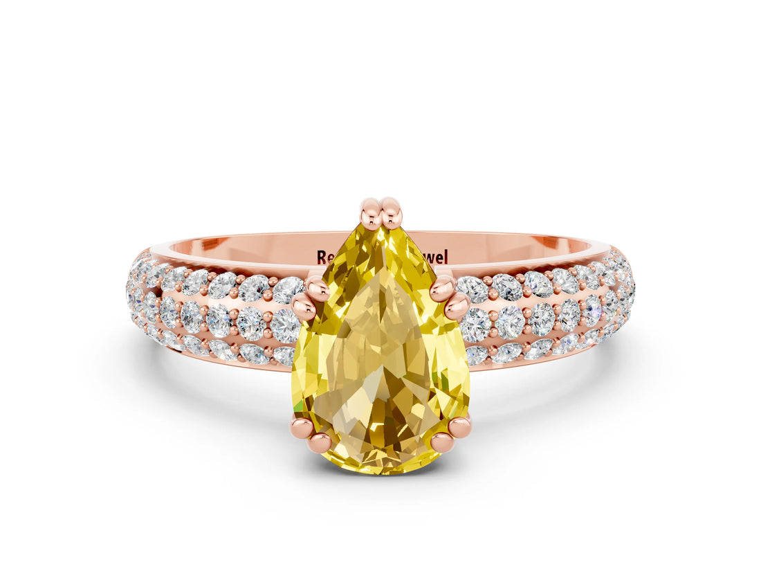 Rose gold Pear Cut Cut Pave Diamond Engagement Ring with Channel Set Band and Four-Prong Setting