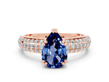 Rose gold Pear Cut Cut Pave Diamond Engagement Ring with Channel Set Band and Four-Prong Setting