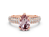 Rose gold Pear Cut Cut Pave Diamond Engagement Ring with Channel Set Band and Four-Prong Setting