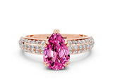 Rose gold Pear Cut Cut Pave Diamond Engagement Ring with Channel Set Band and Four-Prong Setting