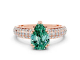 Rose gold Pear Cut Cut Pave Diamond Engagement Ring with Channel Set Band and Four-Prong Setting