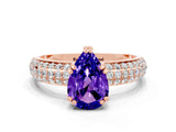 Rose gold Pear Cut Cut Pave Diamond Engagement Ring with Channel Set Band and Four-Prong Setting