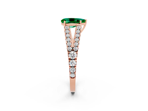 Rose gold Pear Cut Emerald Split Shank Engagement Ring with Round Pavé and Prong Setting
