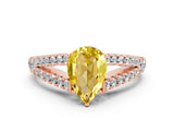 Rose gold Pear Cut Cut Split Shank Pave Diamond Engagement Ring with Four-Prong Setting