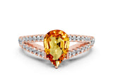 Rose gold Pear Cut Cut Split Shank Pave Diamond Engagement Ring with Four-Prong Setting