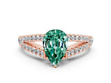 Rose gold Pear Cut Cut Split Shank Pave Diamond Engagement Ring with Four-Prong Setting