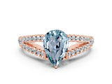 Rose gold Pear Cut Cut Split Shank Pave Diamond Engagement Ring with Four-Prong Setting